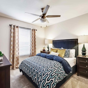 Bedroom of premium apartment at Tonti Lakeside with upgraded ceiling fan and modern furnishings